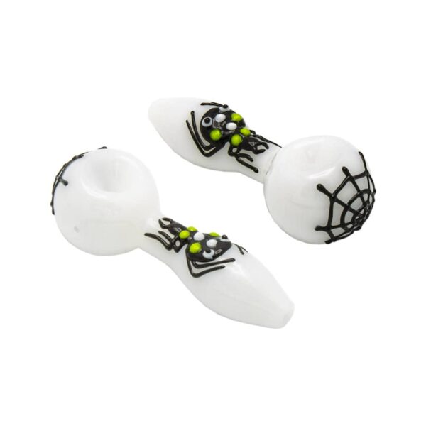 White glass smoking pipe with black spider and web design – Halloween-themed handmade pipe.