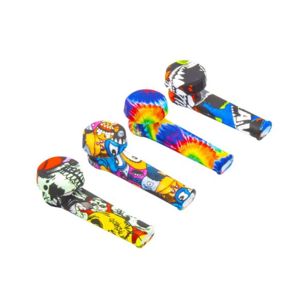 Four colorful silicone smoking pipes with built-in glass bowls and caps, featuring printed designs including tie-dye and comic patterns, displayed on a white background.