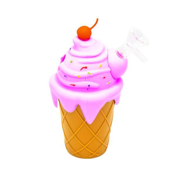 Silicone bong shaped like an ice cream cone with pink frosting design, colorful sprinkles, red cherry topper, and clear glass bowl, displayed on a white background.