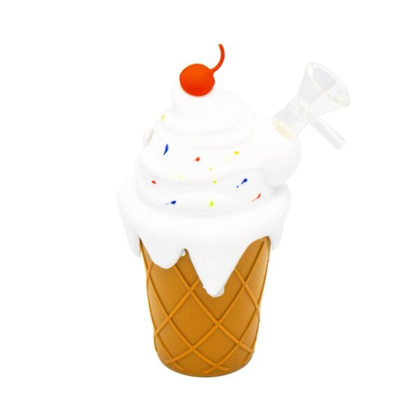 Silicone bong shaped like an ice cream cone with white swirl frosting, colorful sprinkles, red cherry topper, and clear glass bowl, displayed on a white background.