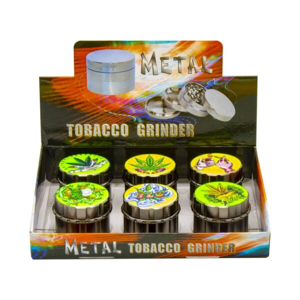 Display of 6 metal herb grinders with glow-in-the-dark cannabis-themed lids, 4-part design with mesh screen and kief catcher