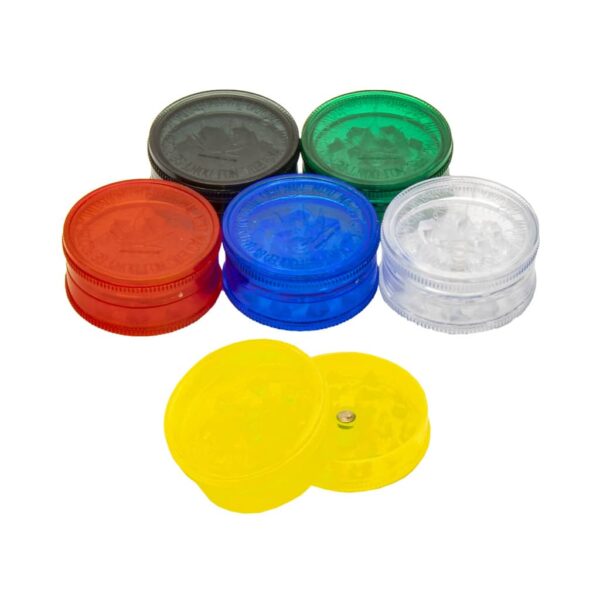 Set of 2-part plastic herb grinders in red, blue, green, black, clear, and yellow, with shark teeth and magnetic lids