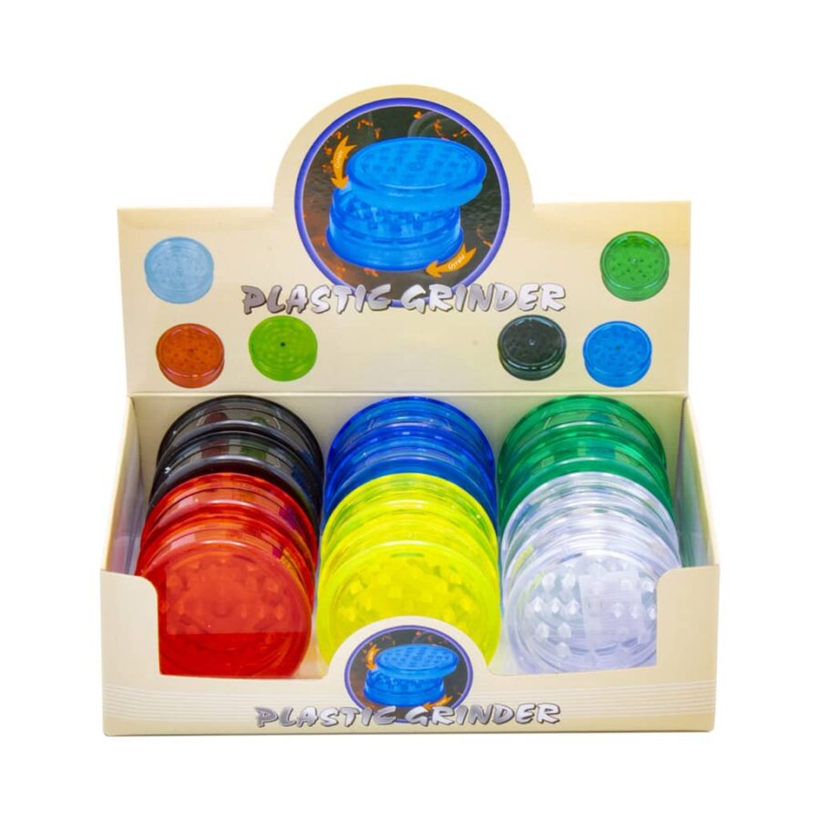 Display of 12 colorful plastic herb grinders with stash storage compartment, 2-part design with shark teeth