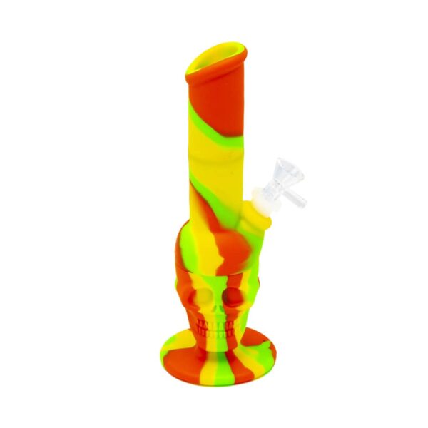 Red, yellow, and green Rasta-themed silicone bong with skull base and clear glass bowl
