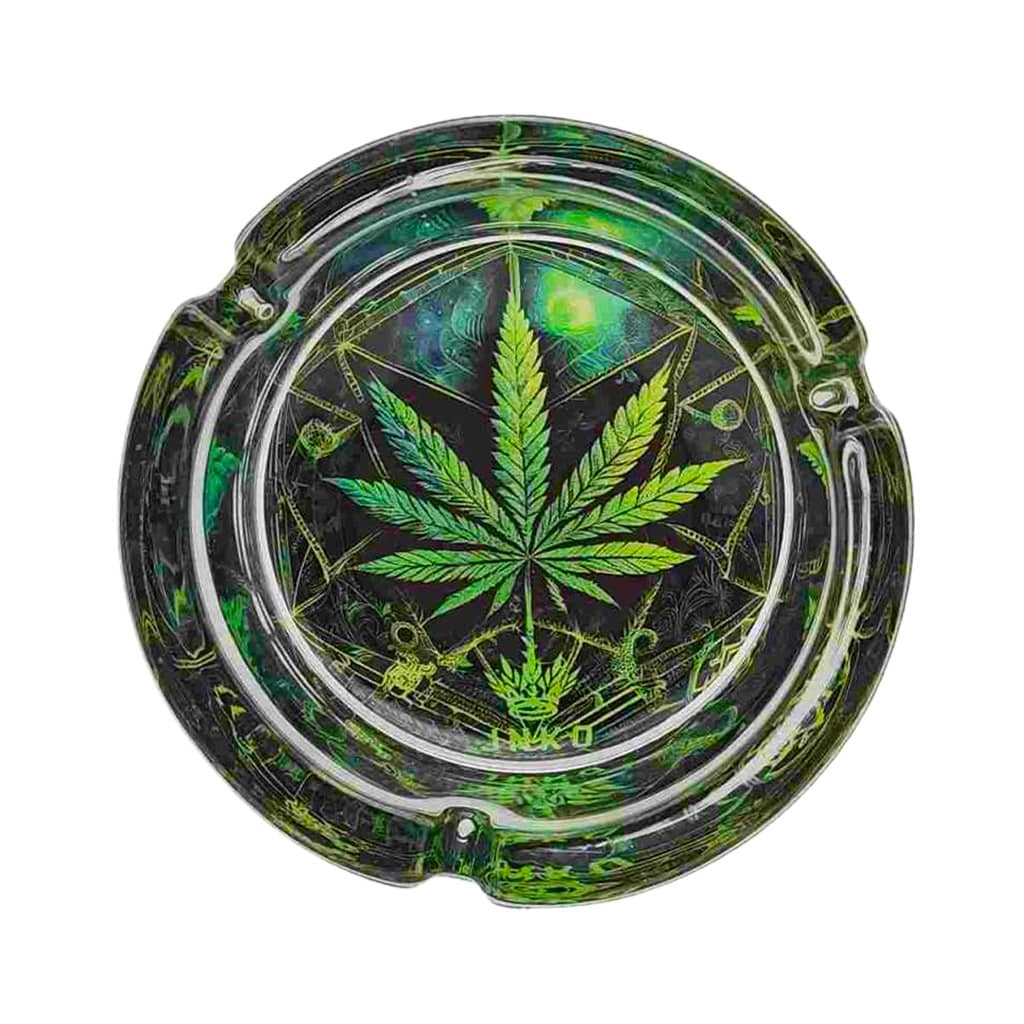 Round glass ashtray with green cannabis leaf design by JNKO, perfect for smoking outdoors or at home.