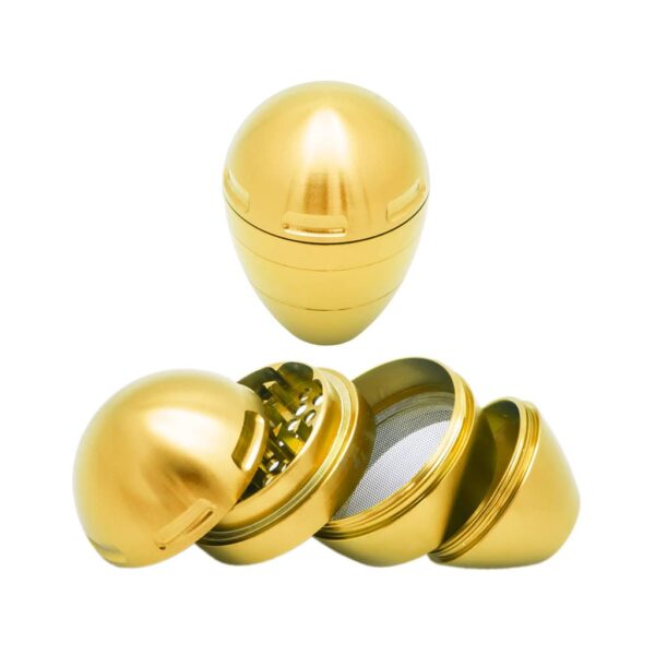 Gold metal egg-shaped herb grinder with 4 parts and pyramid teeth – stylish and durable design.