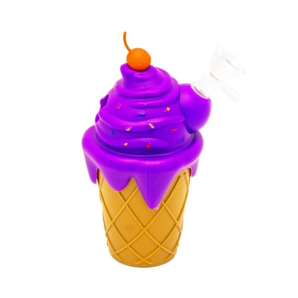 Silicone bong shaped like an ice cream cone with purple frosting, colorful sprinkles, red cherry topper, and clear glass bowl, displayed on a white background.