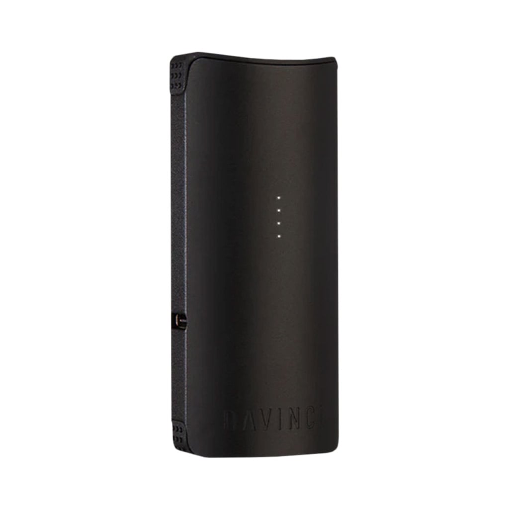 DaVinci Migro-C compact dry herb vaporizer in matte black standing upright on a white background.