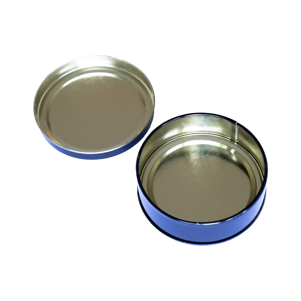 inside of a Multitrance cannabis round metal tin box