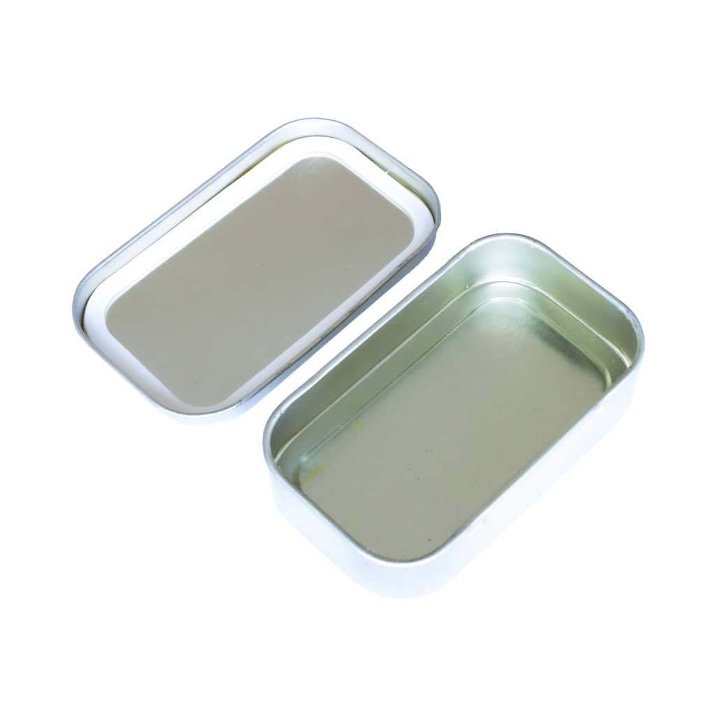 inside of a Multitrance cannabis small square metal tin box