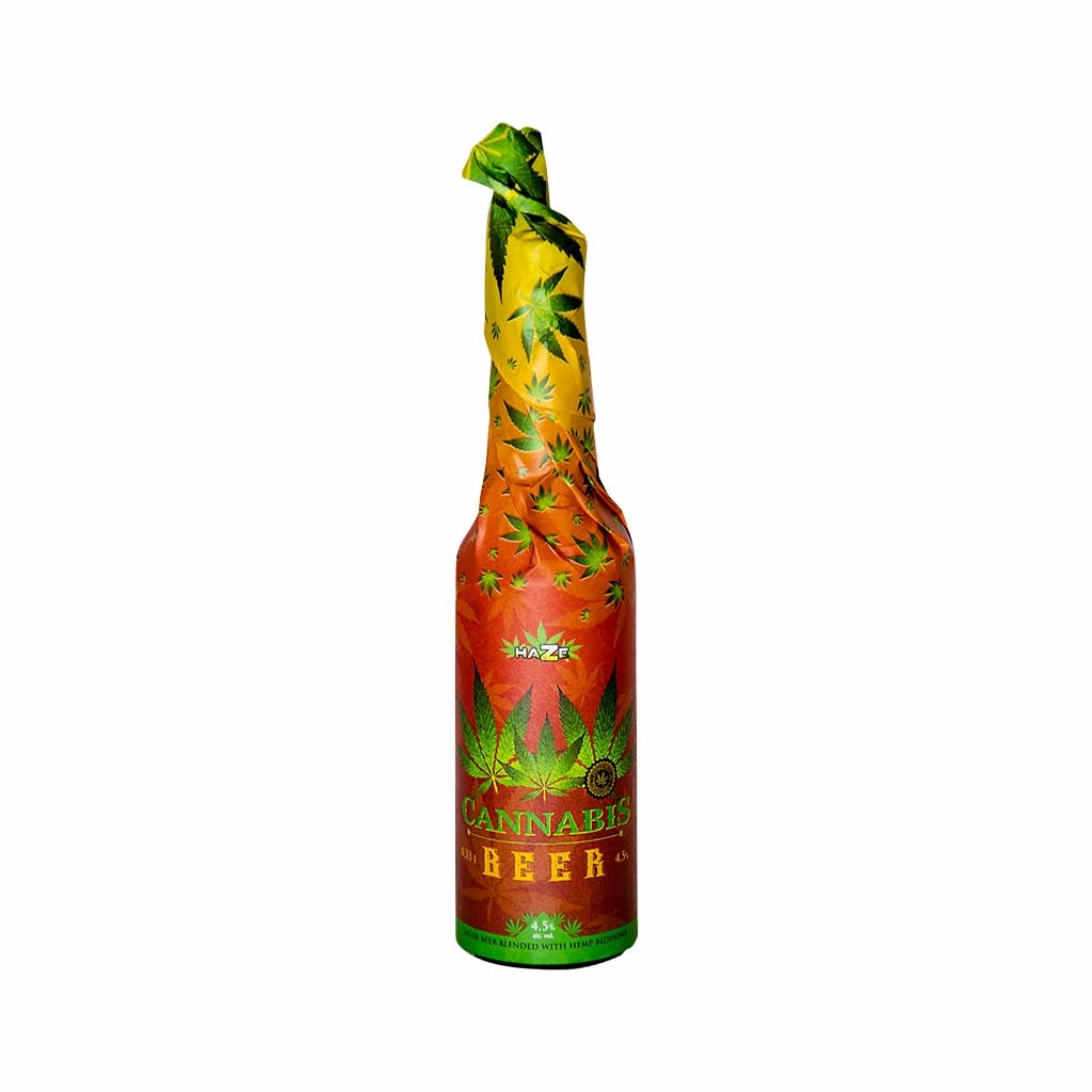 award-winning 330ml bottle of Multitrance cannabis larger beer blended with hemp blossoms and hand-wrapped in rasta decorated paper